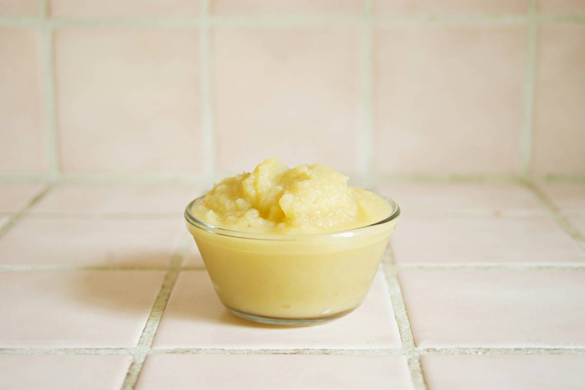 natural body scrubs homemade in glass jars with brown sugar, coconut oil, and lavender